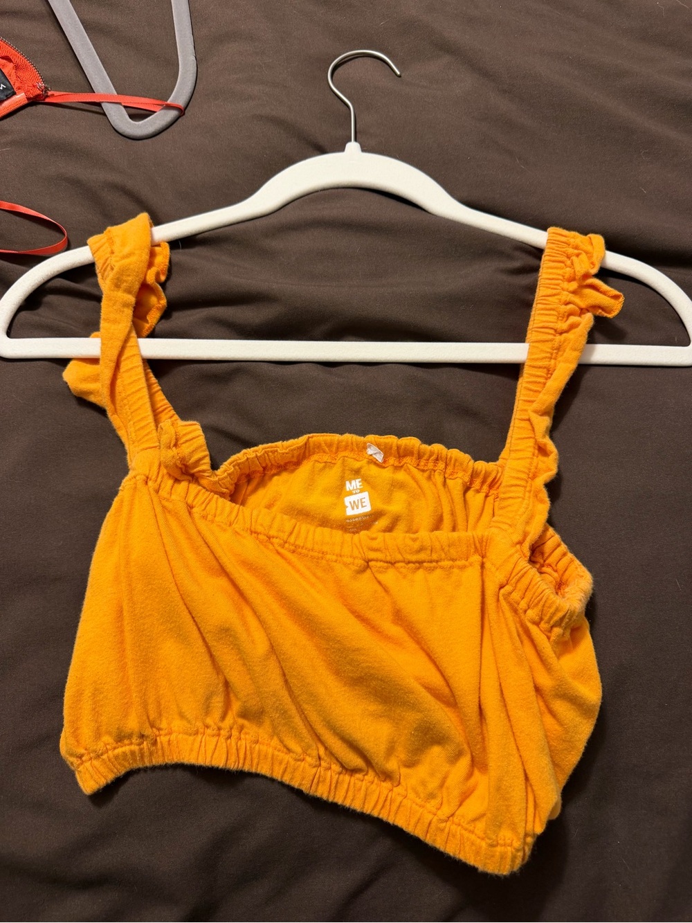 Women’s small orange crop top. Not sure the brand